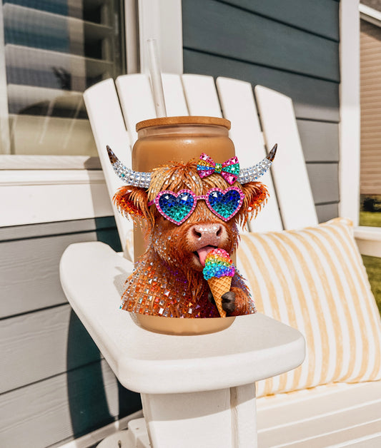 Highland cow eating ice cream